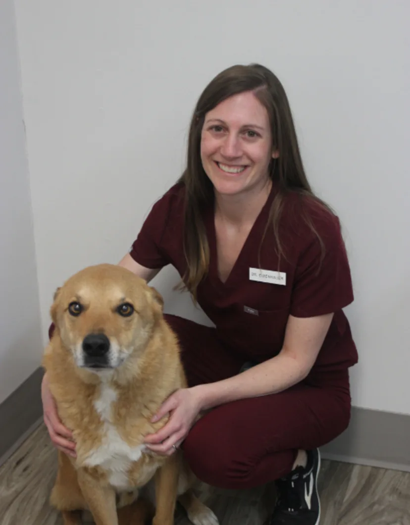 Dr. Gina Eisenhauer, DVM with brown dog